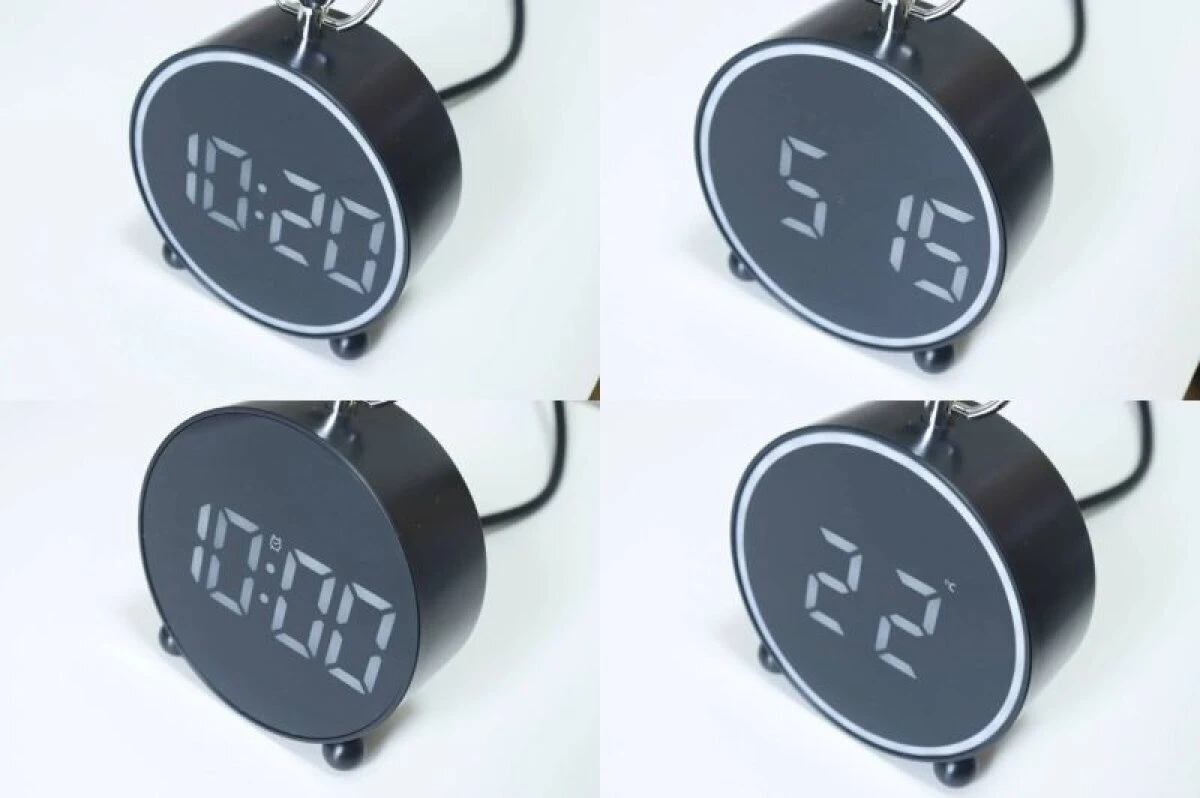 黒い丸型LEDデジタル時計の時刻、アラーム、カレンダー、温度表示が4分割で示されている 黒い丸型LEDデジタル時計の時刻、アラーム、カレンダー、温度表示が4分割で示されている